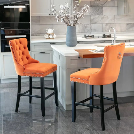 Set of 2 Upholstered Velvet Bar Stools with Rivet and Button Trim, Counter Height Chairs with Back and Footrest for Dining Room, Kitchen, and Pub in Orange